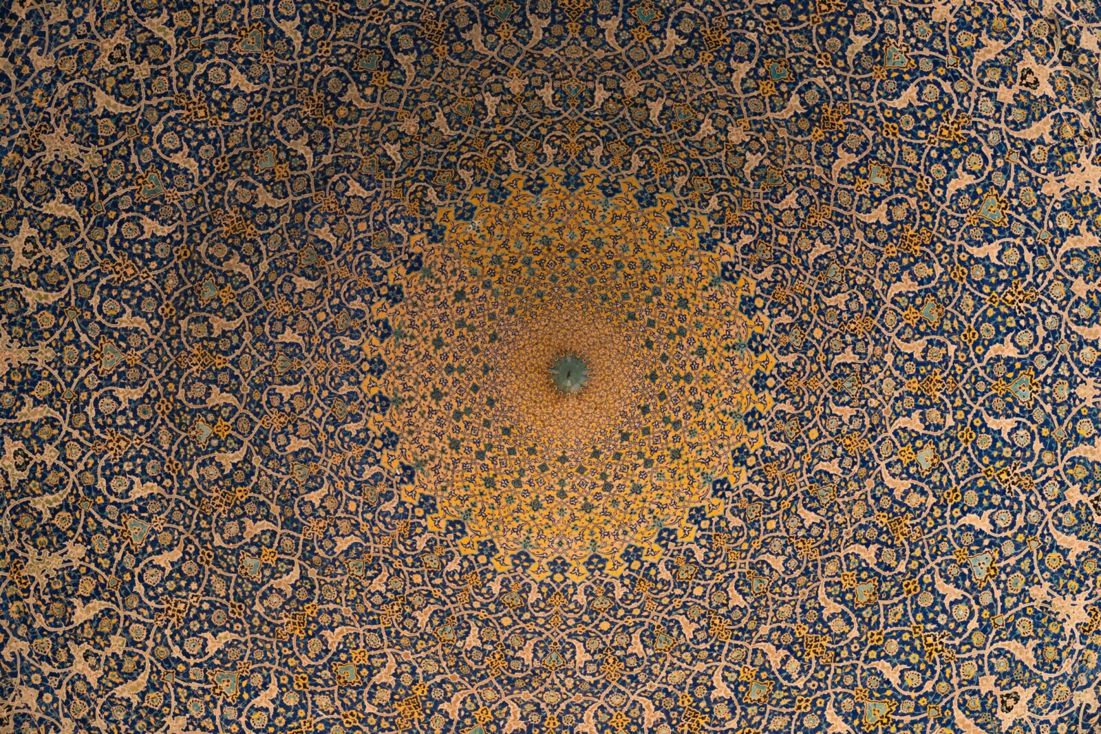 A stunning view of an intricate Islamic geometric ceiling pattern, showcasing art and culture.