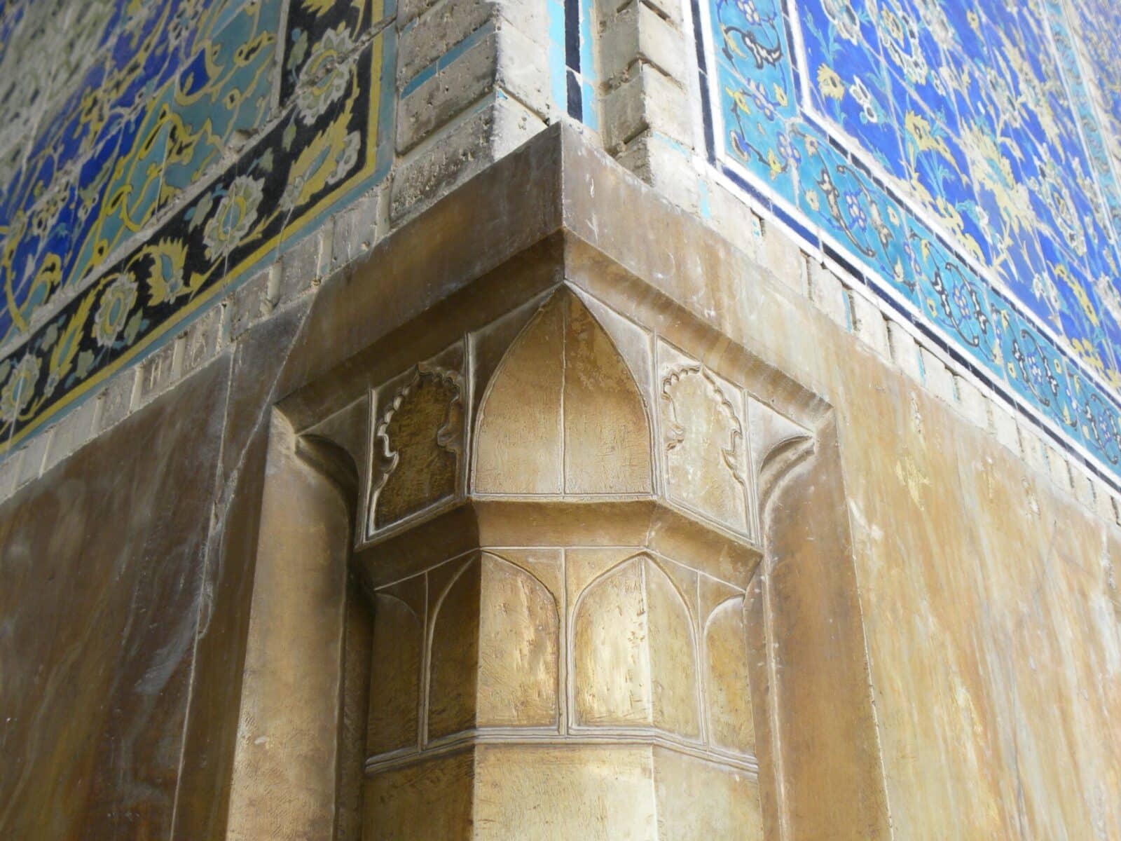 Detailed view of stunning geometric tilework on a mosque in Isfahan, Iran.