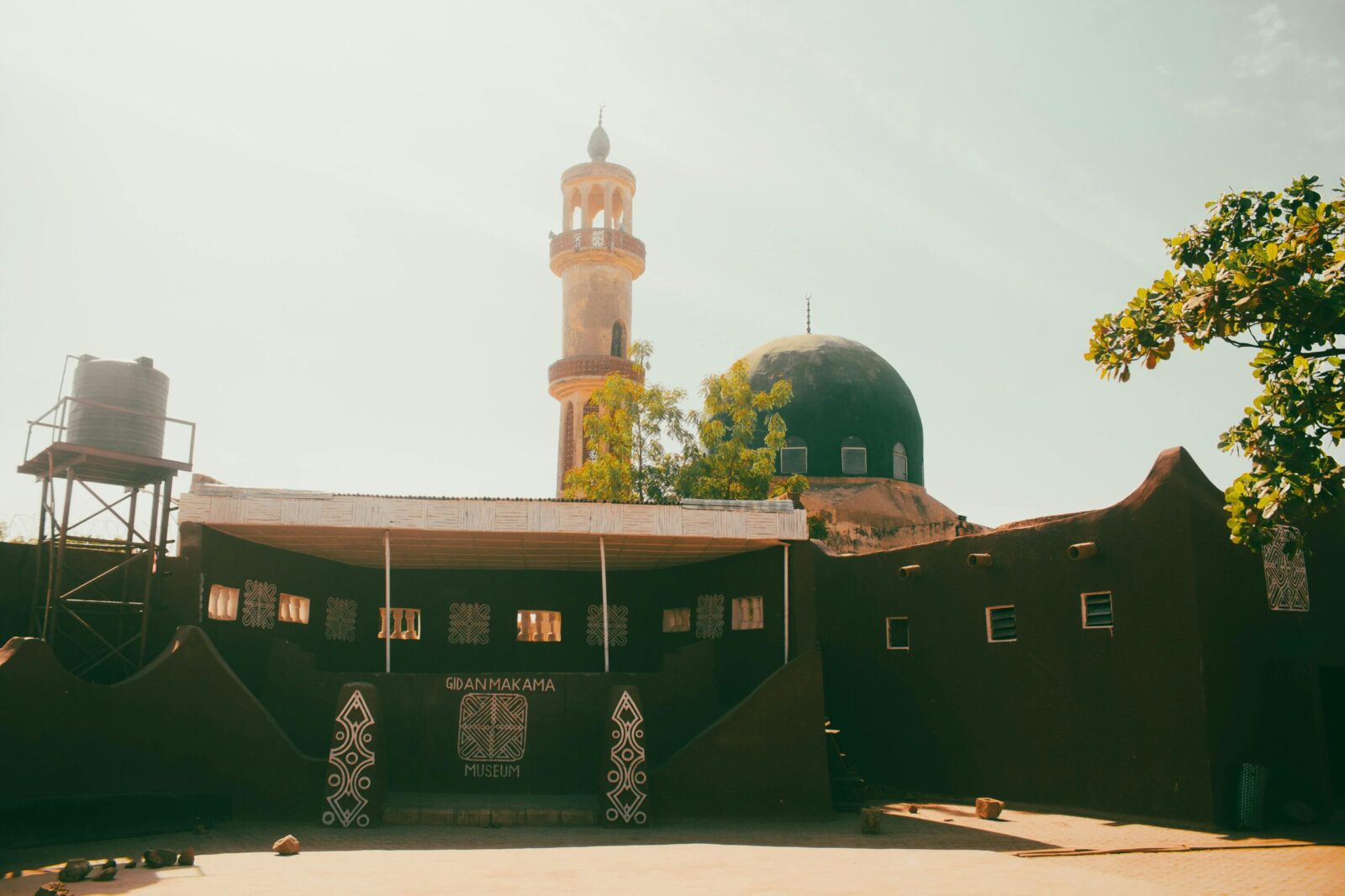 A warm day view of Gidan Makama Museum with a minaret in Kano, Nigeria.